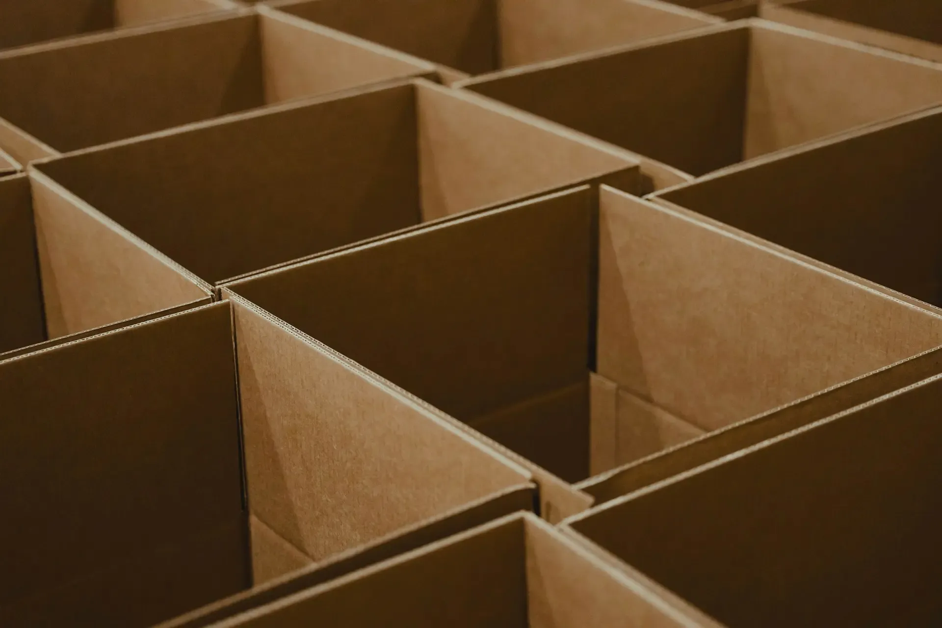 corrugated cardboard shipping boxes lined in rows to easily ship items from BOSS Business Center in New Orleans East
